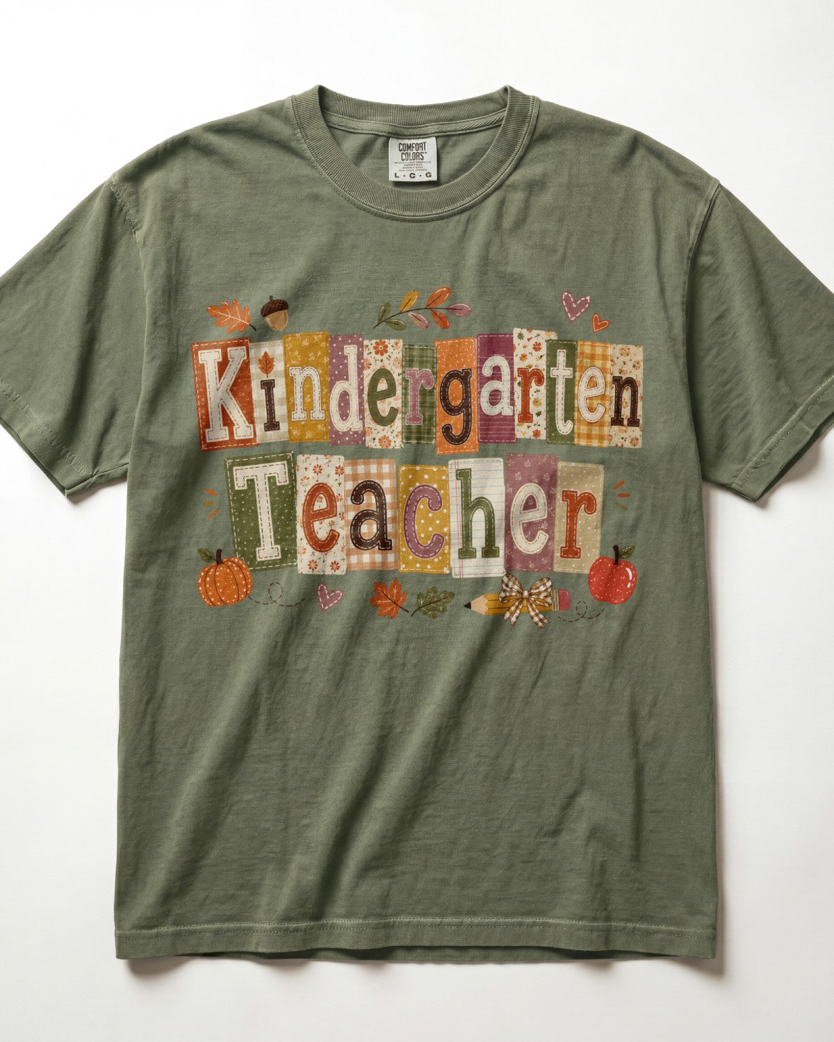 Olive green crew-neck short-sleeve T-shirt with “Kindergarten Teacher” fall graphic print