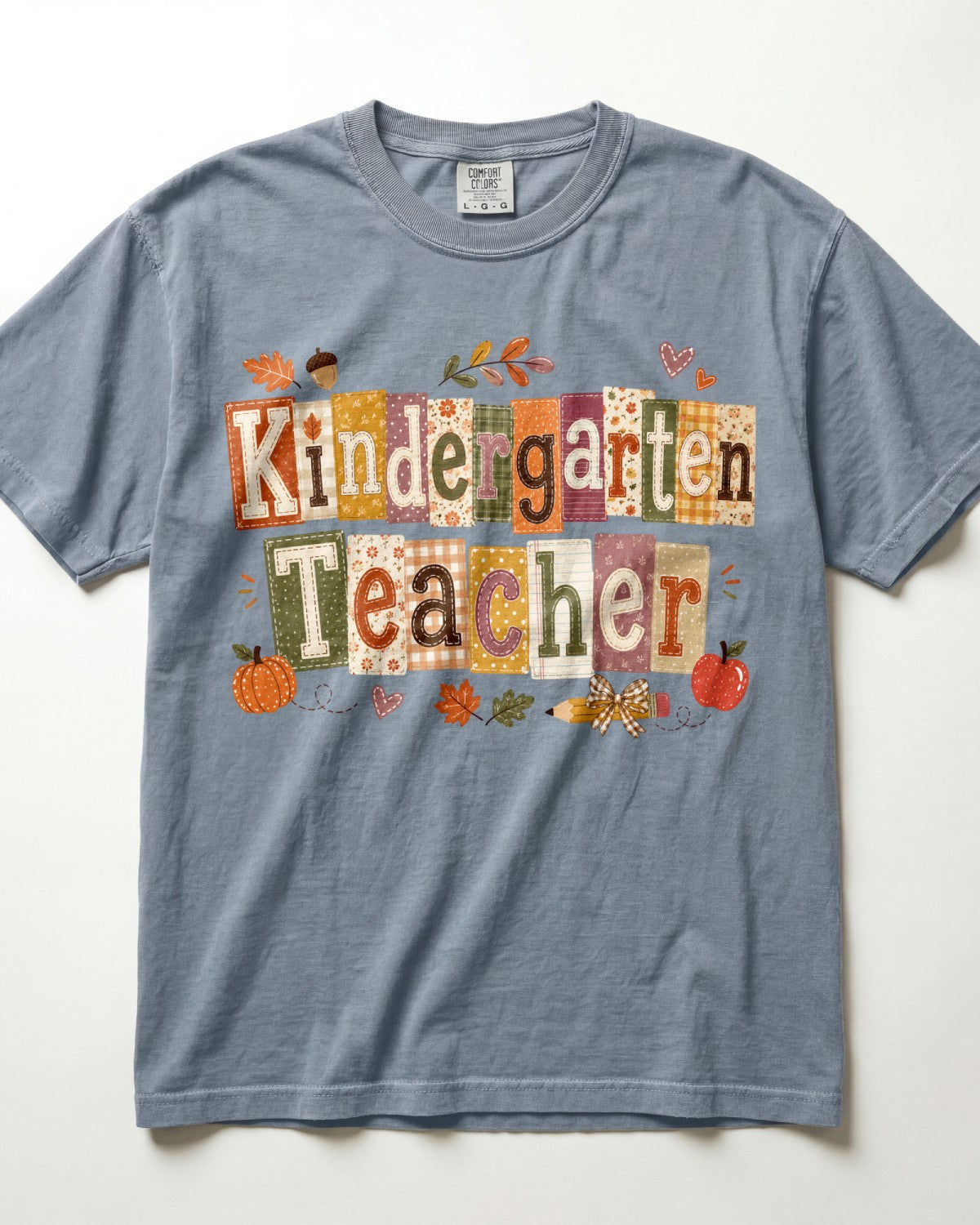 Blue-gray crew-neck short-sleeve T-shirt with “Kindergarten Teacher” fall graphic print