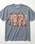 Blue-gray crewneck T-shirt with patchwork Christmas teacher front graphic