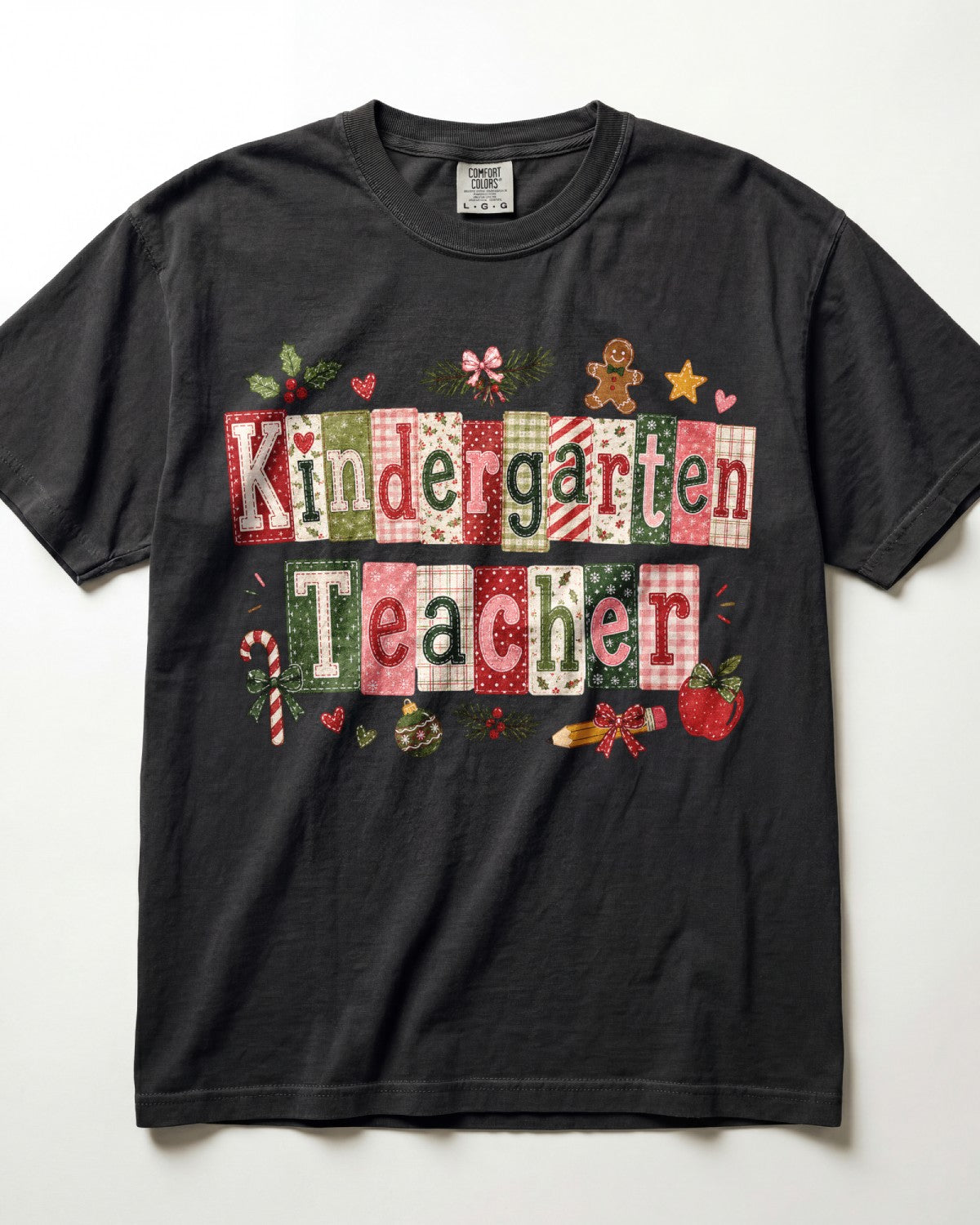 Black crewneck T-shirt with patchwork Christmas teacher front graphic