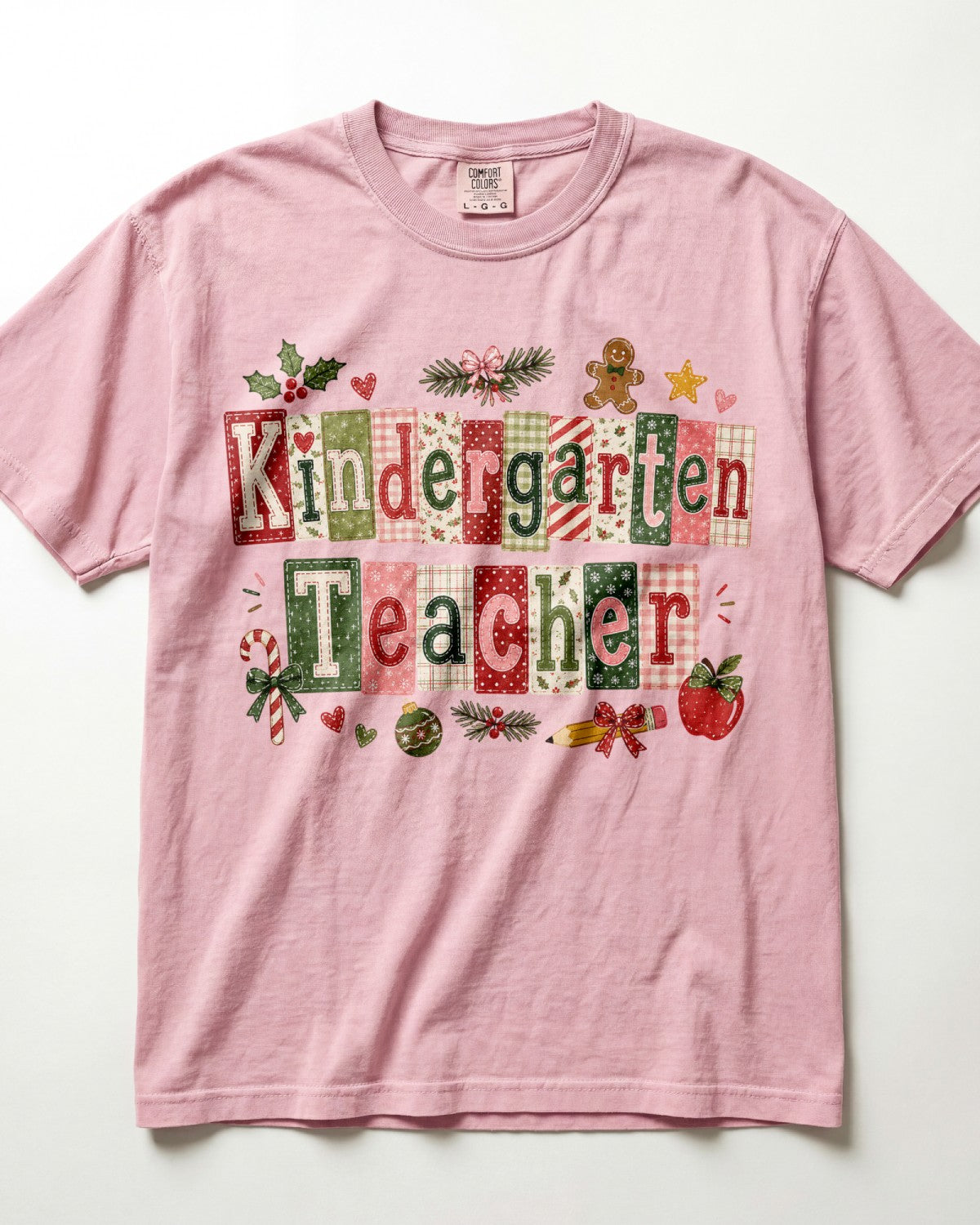 Blush pink crewneck T-shirt with patchwork Christmas teacher front graphic