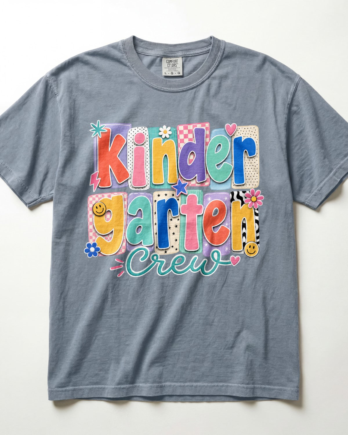 Blue gray crewneck kids T-shirt with “Kinder Garten Crew” colorful graphic print