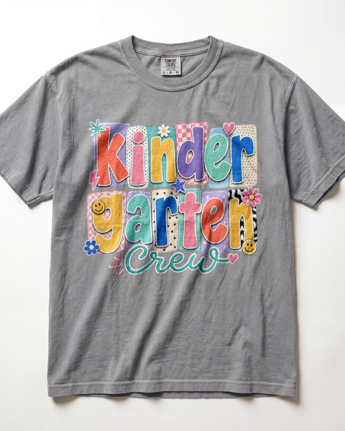 Light gray crewneck kids T-shirt with “Kinder Garten Crew” colorful graphic print