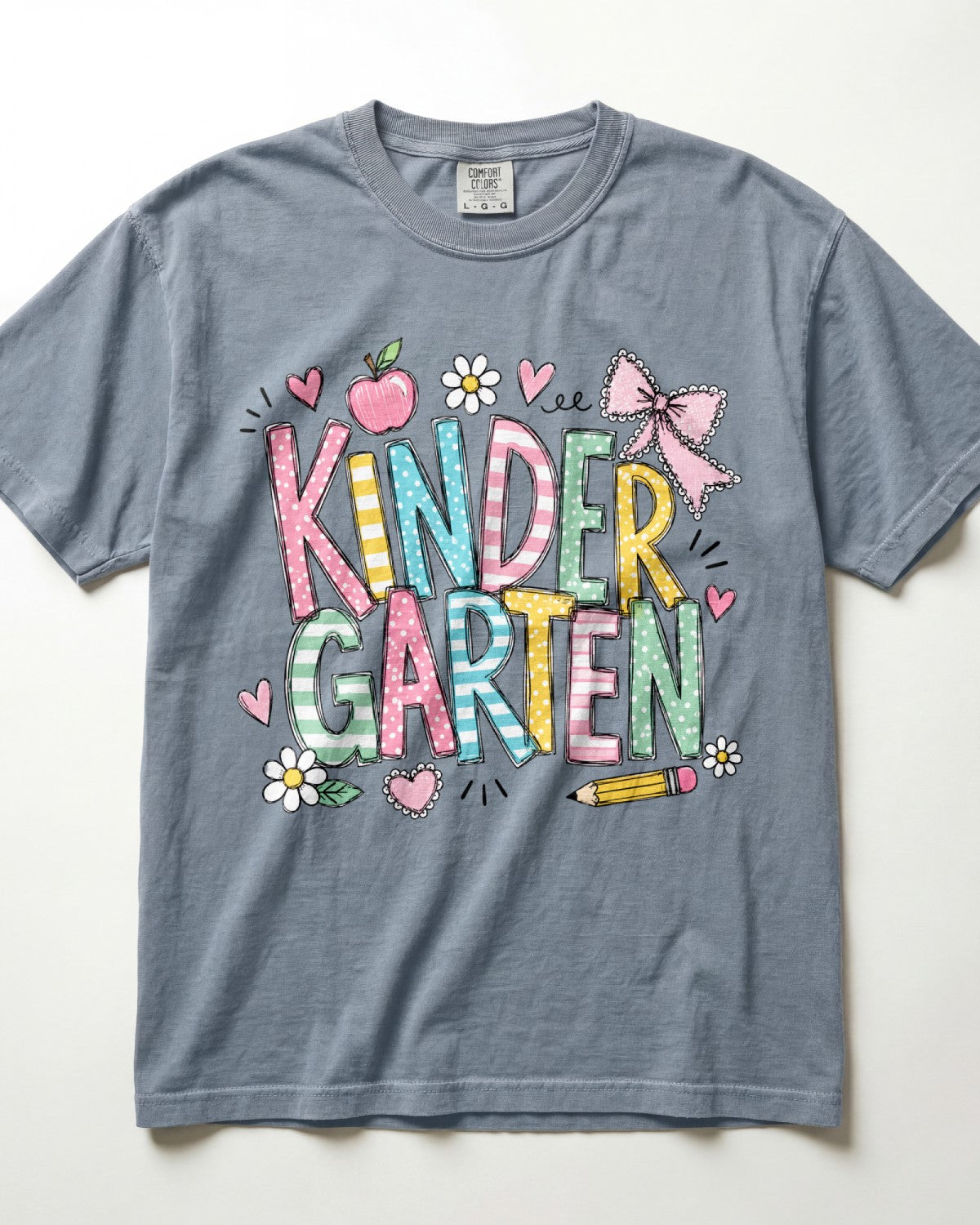 Blue-gray kindergarten teacher T-shirt with colorful “Kinder Garden” graphic and pencils