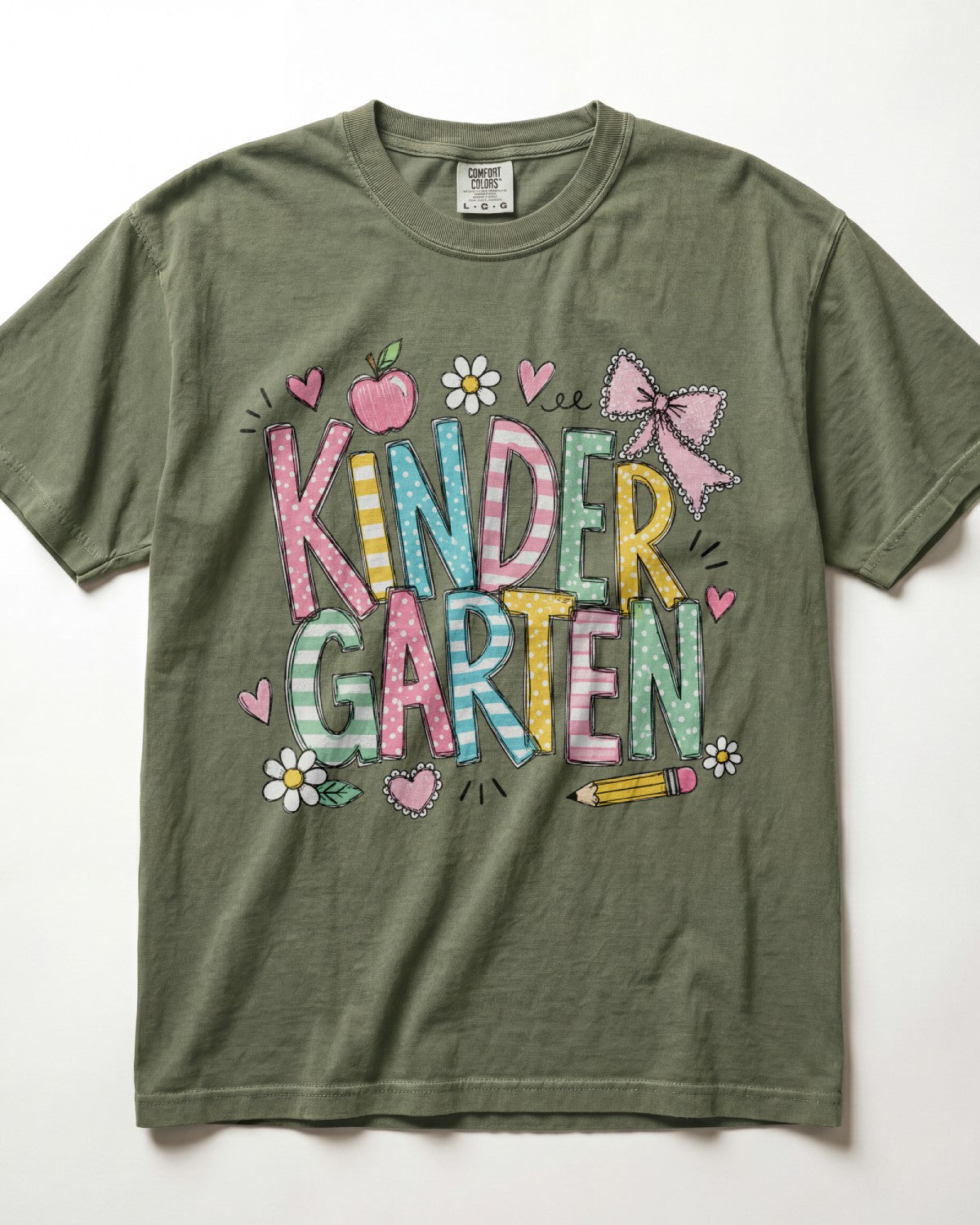 Olive green kindergarten teacher T-shirt with colorful “Kinder Garden” graphic and pencils
