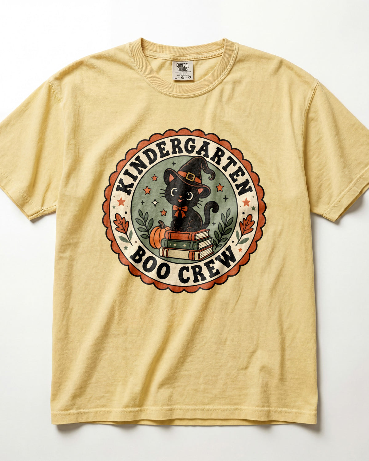 Light yellow crewneck short-sleeve T-shirt with circular “Boo Crew” kindergarten graphic front