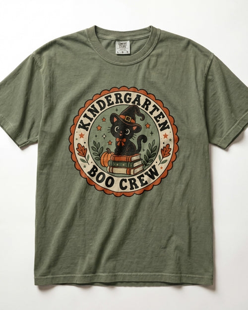 Olive green crewneck short-sleeve T-shirt with circular “Boo Crew” kindergarten graphic front