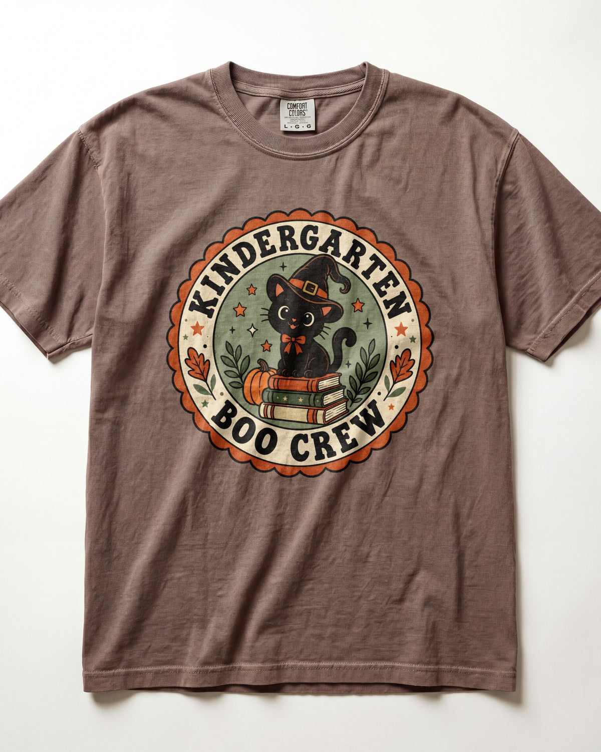 Brown crewneck short-sleeve T-shirt with circular “Boo Crew” kindergarten graphic front