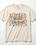 Ivory short-sleeve teacher T-shirt with colorful ABC/123 classroom graphic