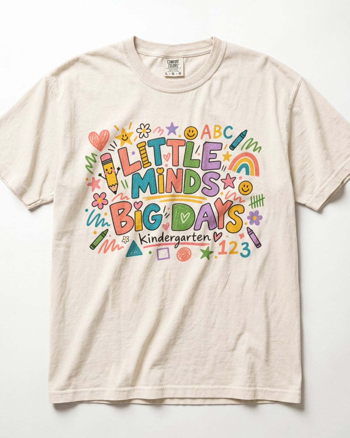 Ivory short-sleeve teacher T-shirt with colorful ABC/123 classroom graphic