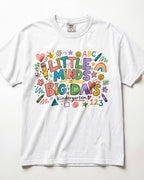 White short-sleeve kids teacher T-shirt with colorful ABC/123 classroom graphic
